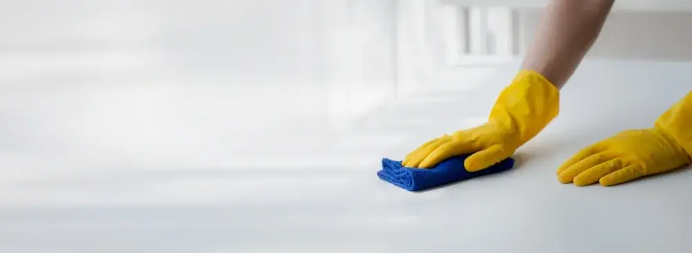 Wiping surface during move out cleaning in West Hartford, CT